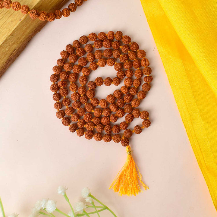 Certified brown Rudraksha mala for mantra chanting, meditation, and spiritual healing. India’s Premium Rudraksha Jap Mala Store- www.satvikworld.com