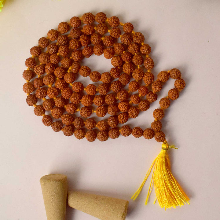Certified Rudraksha mala made from brown Elaeocarpus ganitrus beads, ideal for spiritual practices and meditation. India’s Premium Rudraksha Jap Mala Store- www.satvikworld.com