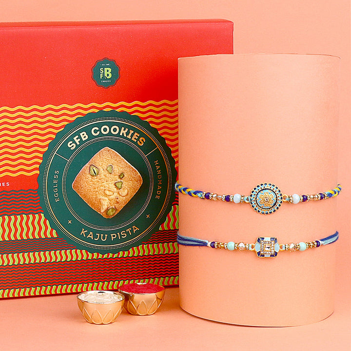 Image of a beautifully designed Rakhi with sweets, the perfect combination of tradition and sweetness for Raksha Bandhan celebration. Shop now at SatvikStore.in. #Rakhi #RakhiOnline #SendRakhi #DesignerRakhi #BeautifulRakhi #LatestRakhi #NewRakhi #ModernRakhi"