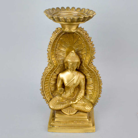 11.4 Inch intricately sculpted brass Buddha candle stand featuring serene detailing, ideal for meditation corners, home décor, or spiritual ambiance. A perfect blend of divinity and decor, crafted to bring peace and elegance to your sacred space. India’s Largest Pooja Accessories Brand – www.satvikworld.com