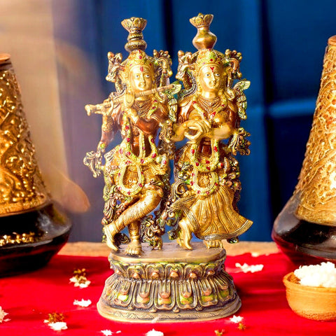 12.5 Inches Vibrant Colored Radha Krishna Brass Idol – A beautifully crafted brass statue of Radha and Krishna with vibrant colors, symbolizing divine love and joy. Perfect for your home temple or spiritual space. India’s Largest Pooja Accessories Brand – www.satvikworld.com