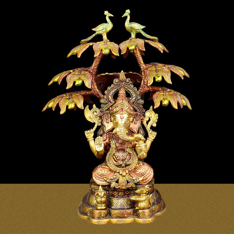 16.5-inch brass idol of Lord Ganesha sitting under a peacock-themed tree, symbolizing wisdom, prosperity, and artistic beauty for home and temple decor. India’s Largest Brass Idols Brand - www.satvikworld.com