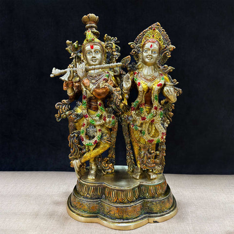 16.5 Inches Gorgeous Radha Krishna Brass Idol – A beautifully crafted idol depicting Lord Krishna and Goddess Radha, symbolizing eternal love and divine harmony. A perfect addition to your home or temple décor, bringing peace and positivity. India’s Largest Pooja Accessories Brand – www.satvikworld.com