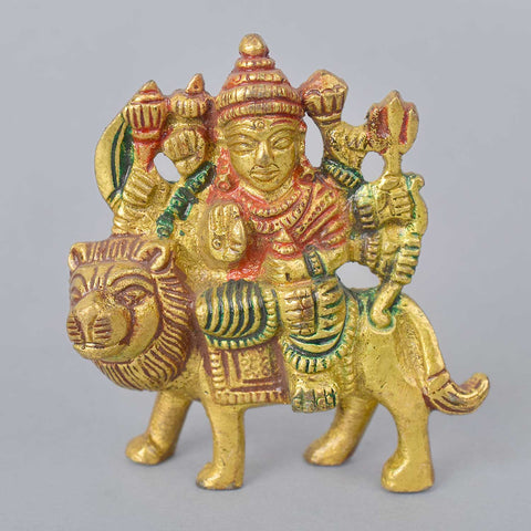 2.6-inch vibrant Sherawali Mata idol depicting the goddess seated majestically on a lion, adorned with colorful attire and detailed ornaments, symbolizing power and divine protection—ideal for worship or dashboard display. India’s Largest Pooja Accessories Brand- www.satvikworld.com