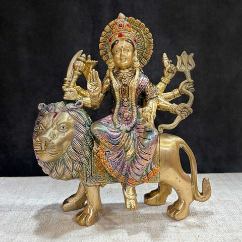 9 inch Exquisite Brass Maa Durga Idol with 8 Arms – Seated on Lion, A Divine Representation of Goddess Durga in Her Powerful Form, Symbolizing Strength, Protection, and Victory Over Evil. This Intricately Designed Brass Idol Features Maa Durga with 8 Arms, Mounted on a Lion, and is Perfect for Spiritual Worship and Home Temple Decor. India’s Largest Pooja Accessories Brand – www.satvikworld.com