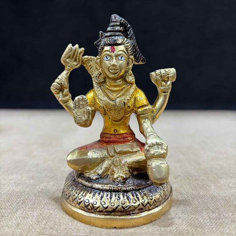 4-inch brass Chaturbhuj Shiva Ji idol, depicting Lord Shiva with four arms, intricately detailed with divine symbols, symbolizing power, protection, and spiritual balance. Ideal for worship or spiritual décor. India’s Largest Pooja Accessories Brand – www.satvikworld.com