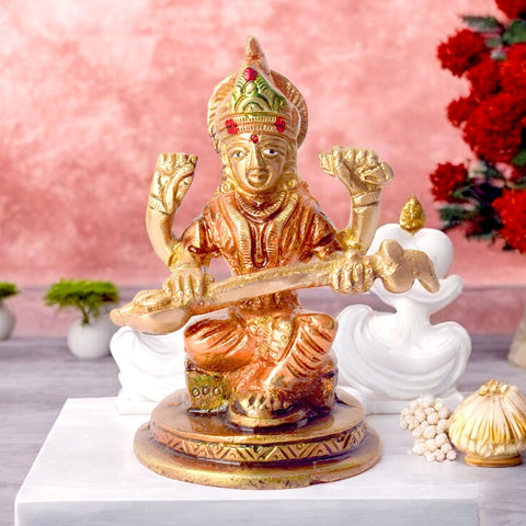 Exquisite handcrafted brass Saraswati idol, intricately designed, depicting the Goddess of wisdom and knowledge, holding her veena and book. Perfect for worship, study spaces, or as a thoughtful gift. India’s Largest Pooja Accessories Brand – www.satvikworld.com