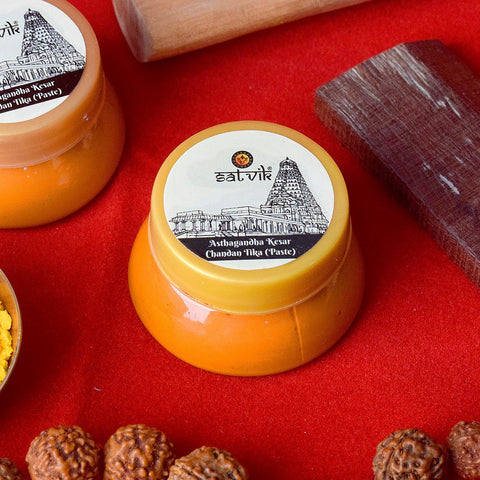 Ashtagandha Kumkum Chandan Tika paste in a small container, used for applying sacred tilak during pooja and religious ceremonies, featuring a blend of Chandan and Kumkum for auspicious rituals. India’s Largest Pooja Accessories Brand – www.satvikworld.com