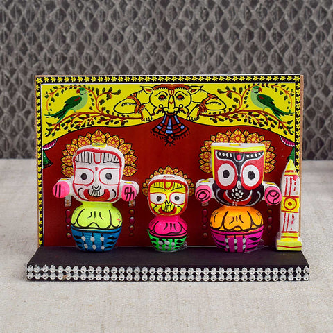 Handcrafted and painted wooden Lord Jagannath idol for car dashboard – traditional Pattachitra-style murti for protection, devotion, and spiritual harmony. India’s Largest Pooja Accessories Brand - www.satvikworld.com
