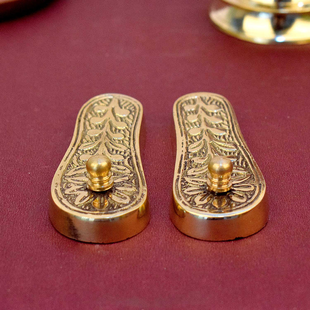 "Divine Brass Charan Paduka (Khadau) for Temple and Home Mandir Worship placed for spiritual offerings". 
India’s Largest Pooja Accessories Brand - www.satvikworld.com