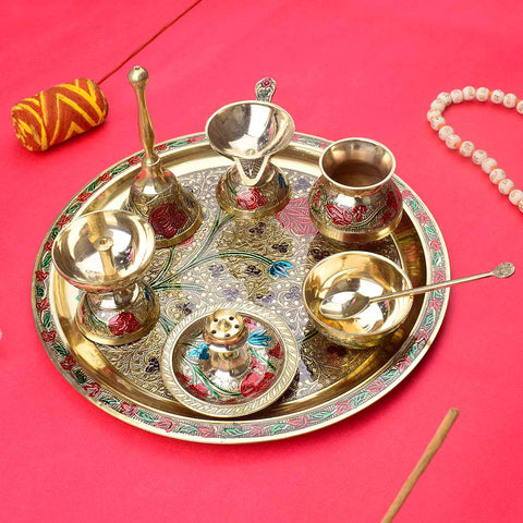 Elegant 8-piece brass puja thali set with 10-inch plate, beautifully arranged in a luxurious premium velvet box for traditional rituals. India’s Largest Pooja Accessories Brand – www.satvikworld.com