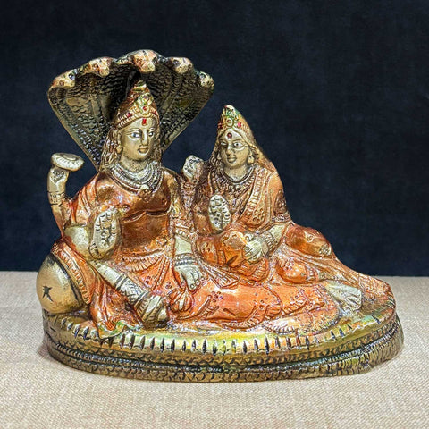 4.7 Inch Vishnu Ji Resting on Sheshnag with Parvati – Small Divine Brass Statue of Lord Vishnu Reclining on Sheshnag with Goddess Parvati, Symbolizing Cosmic Protection, Peace, and Divine Harmony, Perfect for Temple, Home Decor, and Spiritual Worship, Handcrafted with Intricate Detailing for a Sacred Touch, Ideal for Puja and Mandir Decoration, Buy Vishnu and Parvati Statue Online, Affordable God Statue Prices | India’s Largest Pooja Accessories Brand – www.satvikworld.com