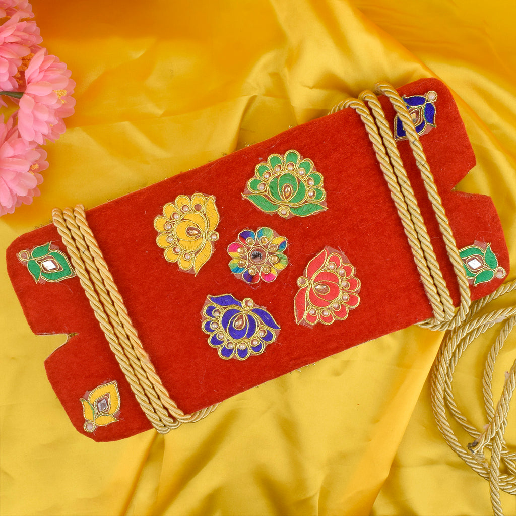 Graceful red floral Jhula adorned with vibrant artificial flowers and traditional decorative elements, perfect for enhancing Teej festival celebrations. India’s Largest Pooja Accessories Brand – www.satvikworld.com