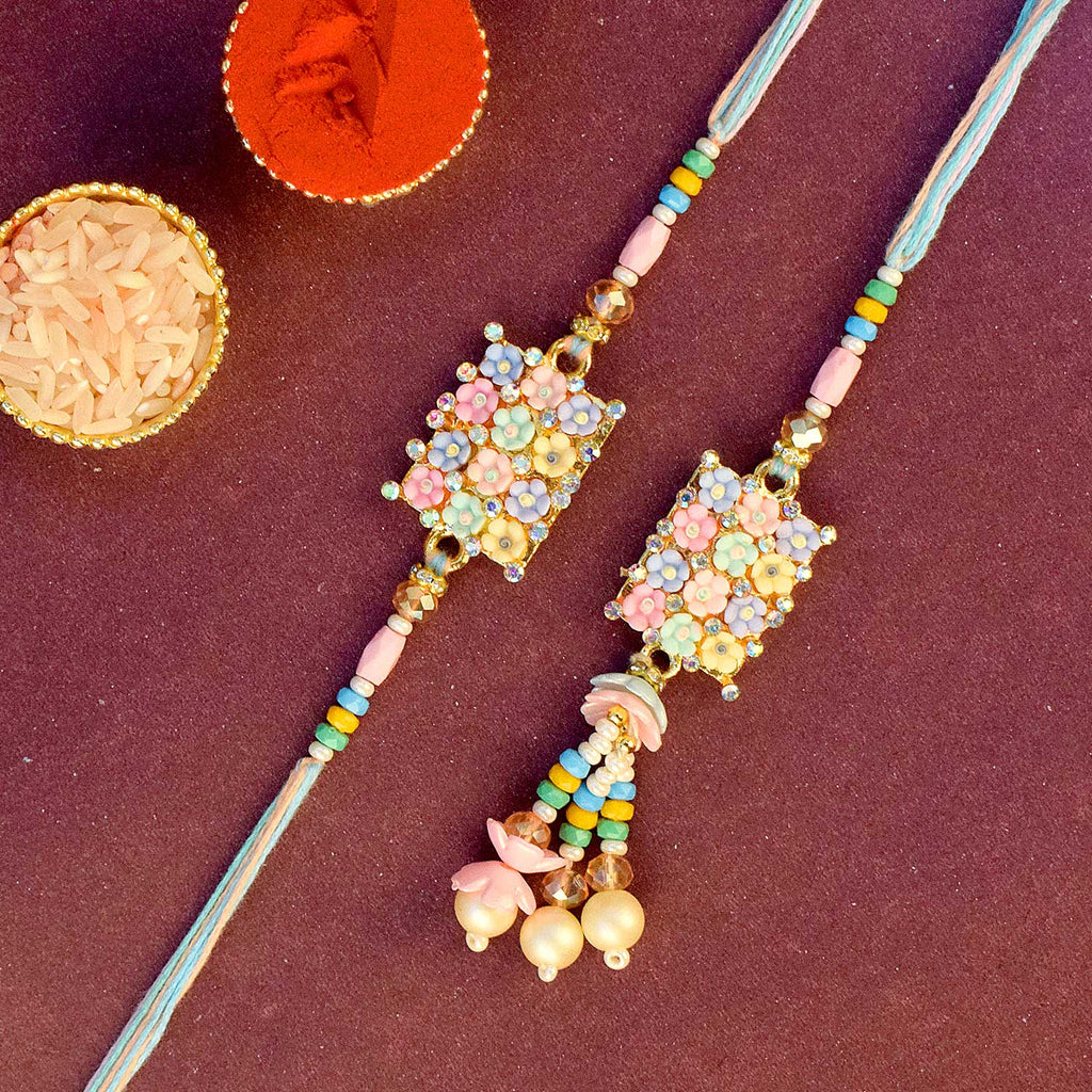 Designer Couple Rakhi Set for Bhaiya and Bhabhi with Roli Chawal and Ram Sita Stickers – Raksha Bandhan Gift Combo. India’s Largest Brass Idols Brand - www.satvikworld.com