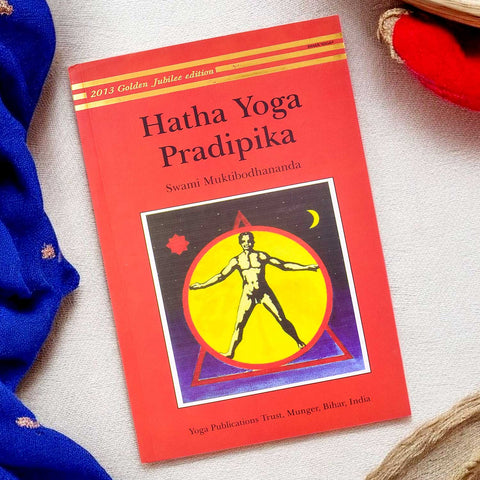 Hatha Yoga Pradipika Light On Hatha Yoga Paperback, a classic text on the teachings of Hatha Yoga, offering guidance on asanas, pranayama, mudras, and bandhas to enhance physical, mental, and spiritual well-being. India’s Largest Pooja Accessories Brand – www.satvikworld.com