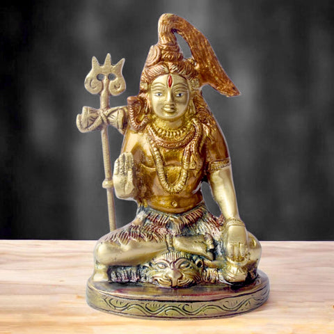 6-inch brass Shiv idol, a divine Lord Shiva statue depicting the serene and powerful form of the deity. Perfect for pooja rooms and spiritual spaces. India’s Largest Pooja Accessories Brand – www.satvikworld.com