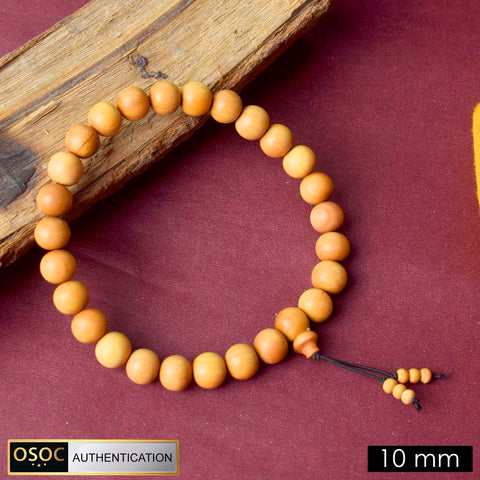 Pure 10mm Elastic 27 Bead White Chandan Money Mala made from authentic sandalwood for wealth attraction, spiritual protection, and daily meditation. India’s Premium Jap Mala Store - www.satvikworld.com
