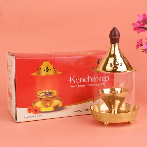 Pure Brass Kanchdeep Akhand Chimney Diya, beautifully crafted with an elegant chimney design, perfect for uninterrupted lighting during religious ceremonies and pooja rituals. India’s Largest Pooja Accessories Brand – www.satvikworld.com