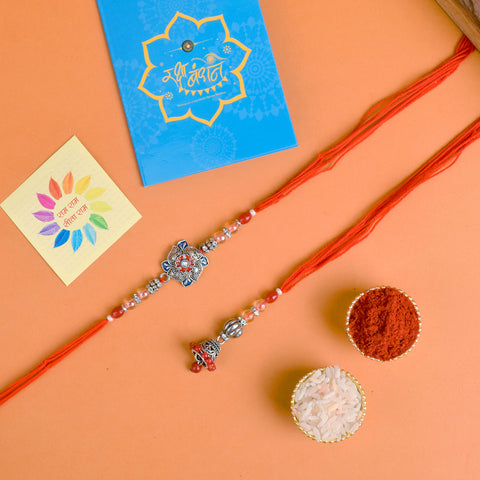 Designer Couple Rakhi Set for Bhaiya and Bhabhi with Roli Chawal and Ram Sita Stickers – Raksha Bandhan Gift Combo. India’s Largest Brass Idols Brand - www.satvikworld.com