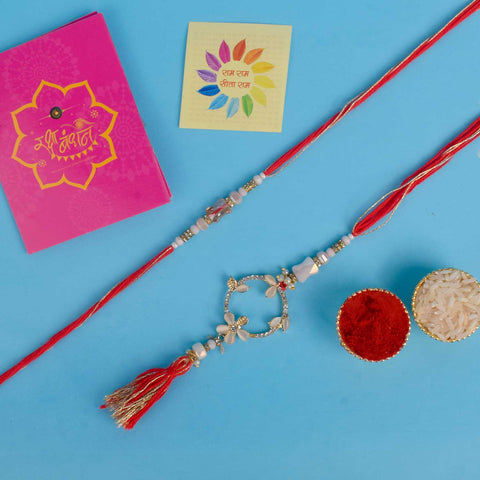 Designer Couple Rakhi Set for Bhaiya and Bhabhi with Roli Chawal and Ram Sita Stickers – Raksha Bandhan Gift Combo. India’s Largest Brass Idols Brand - www.satvikworld.com