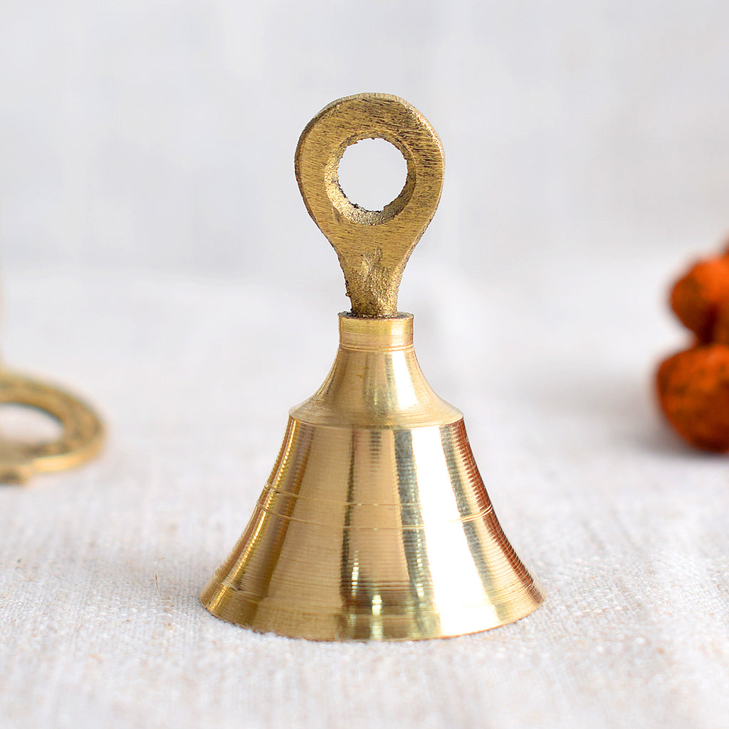 Compact size-2 brass pooja bell designed for clear, resonant sound during sacred rituals, enhancing spiritual ambiance. India’s Largest Pooja Accessories Brand – www.satvikworld.com