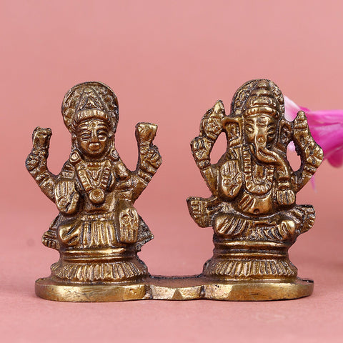 Elegant brass Laxmi Ganesh idol showcasing Goddess Laxmi and Lord Ganesha in seated posture with intricate detailing, traditional attire, and symbolic elements—crafted for blessings of wealth, wisdom, and harmony in homes or offices.  India’s Largest Pooja Accessories Brand- www.satvikworld.com