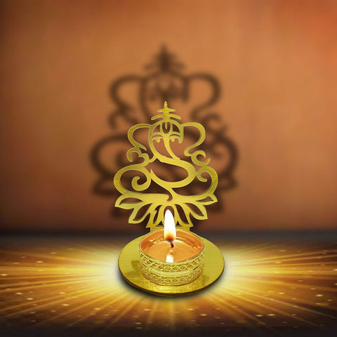 Handmade Lord Ganesha Shadow Diya made from durable metal, designed to cast a radiant shadow of Lord Ganesha when lit, ideal for spiritual ambiance in pooja rooms or festive home décor. India’s Largest Pooja Accessories Brand – www.satvikworld.com