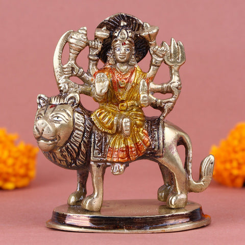 Fascinating brass Sherawali Mata idol, intricately crafted with detailed features, depicting Goddess Sherawali seated on a lion, symbolizing strength, protection, and divine grace. Ideal for worship or spiritual décor. India’s Largest Pooja Accessories Brand – www.satvikworld.com