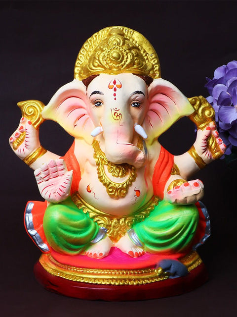 9 Inch Skandapurvaja Ganesha idol made of eco-friendly clay, seated in a divine and serene posture with detailed artwork. India’s Largest Pooja Accessories Brand – www.satvikworld.com